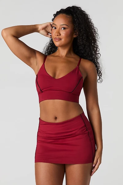 Miniskort avec détail passepoil Active