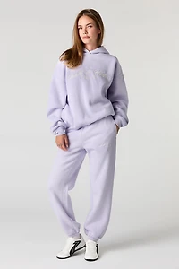 Jogger en molleton avec motif brodé Health & Wellness