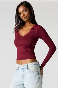 Haut profilé classique en dentelle à manches longues