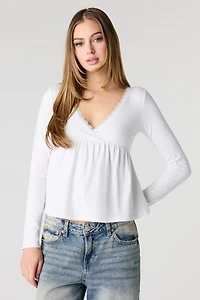 Haut nuisette à manche longue et bordure en dentelle