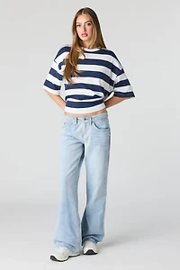 Jean à jambe évasée et taille basse
