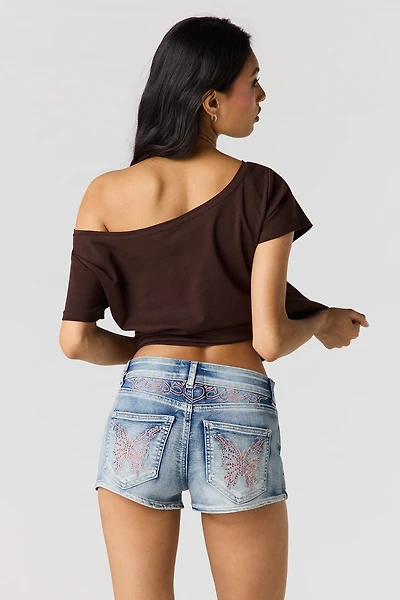 Short court à taille basse en denim extensible orné de pierres du Rhin