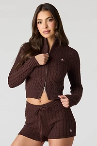 Chandail en tricot torsadé avec motif brodé et fermeture à glissière double