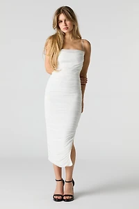 Robe midi moulante en filet ruché