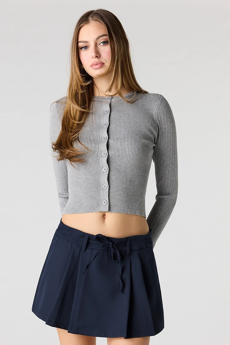 Cardigan en tricot côtelé boutonné à l'avant