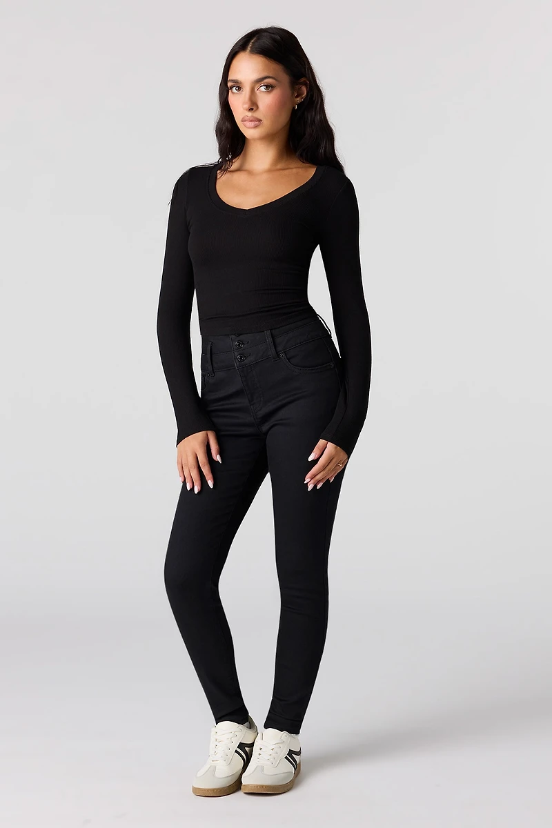 Jean remonte-fesses ajusté noir à taille haute