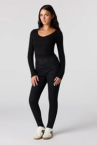 Jean remonte-fesses ajusté noir à taille haute