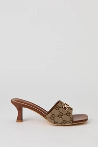 Mule avec boucle et monogramme