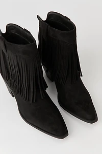 Bottes de cow-boy aux chevilles avec franges