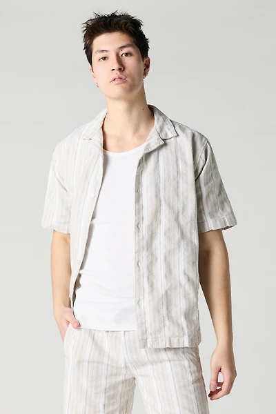 Haut boutonné en tricot rayé