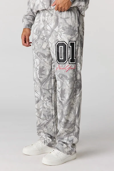 Pantalon d'entraînement baggy en molleton imprimé