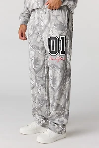 Pantalon d'entraînement baggy en molleton imprimé
