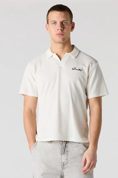 Polo en tricot gaufré brodé