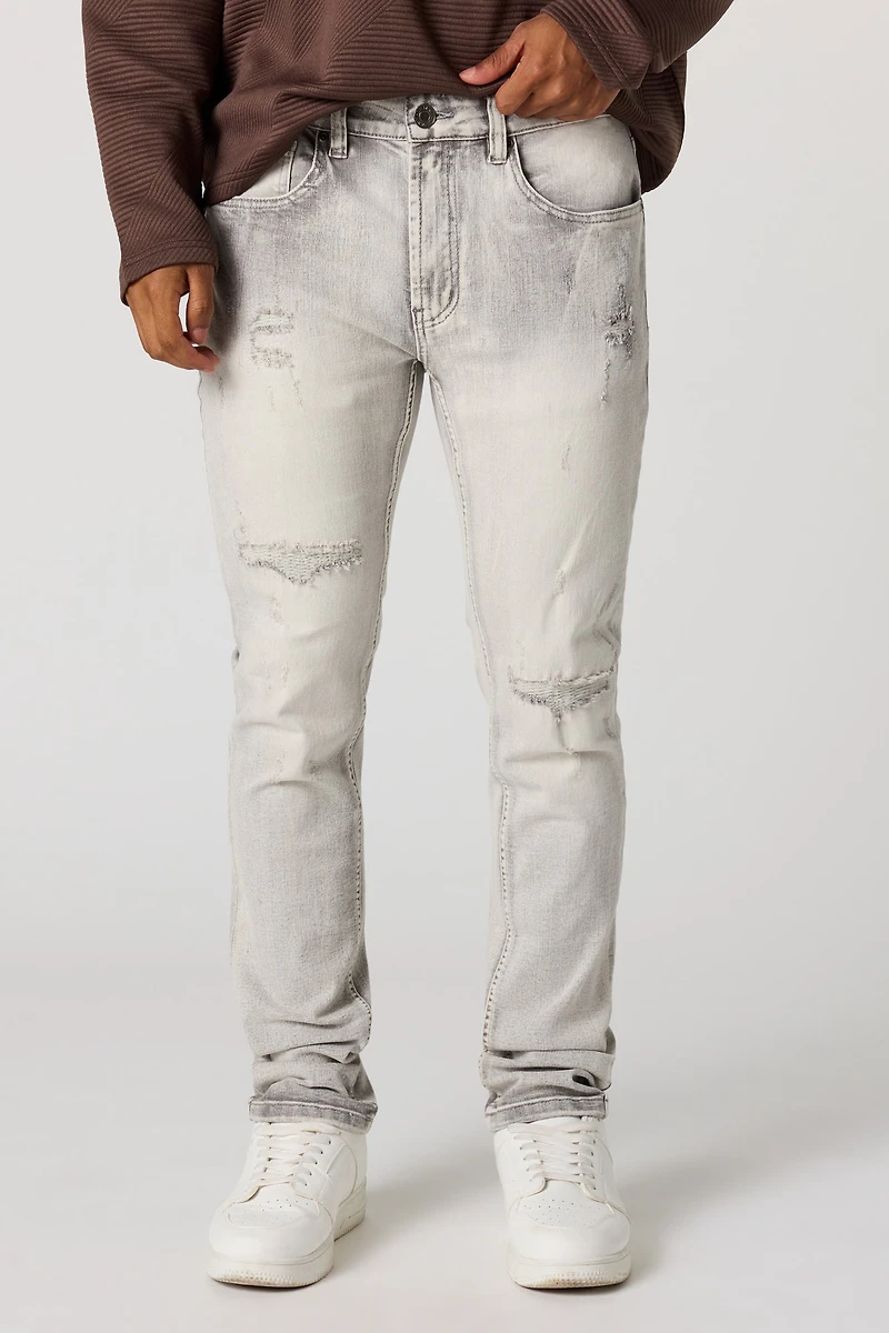 Jean ajusté déchiré gris