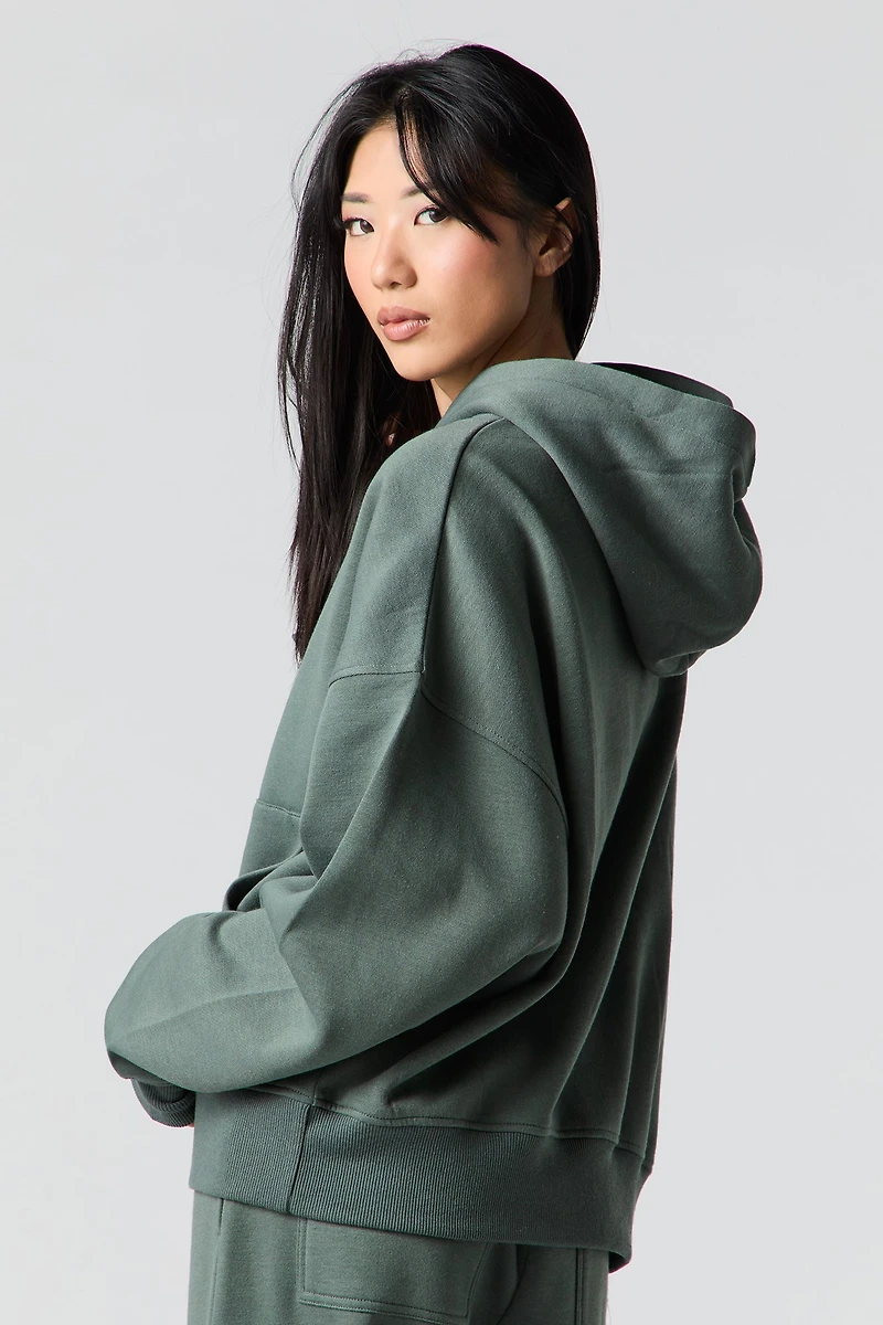 Haut à capuchon en molleton carré