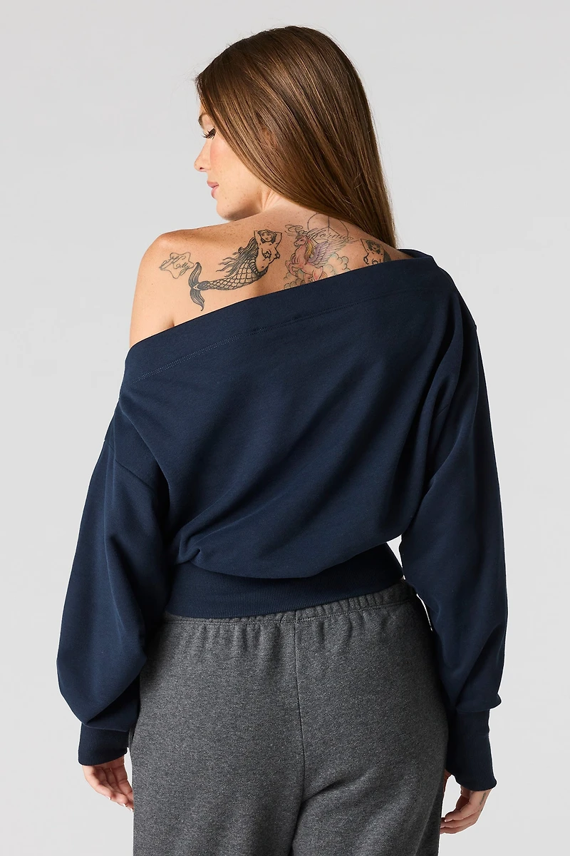 Chandail en tissu bouclé de luxe à épaules dénudées