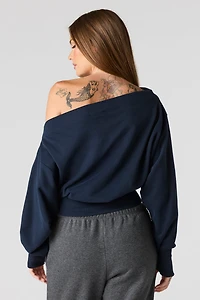 Chandail en tissu bouclé de luxe à épaules dénudées