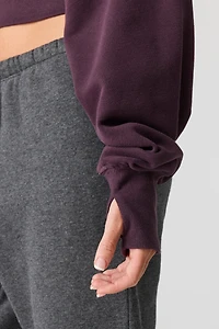 Chandail en tissu bouclé de luxe à épaules dénudées