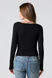 Haut boutonné en pointelle à col V