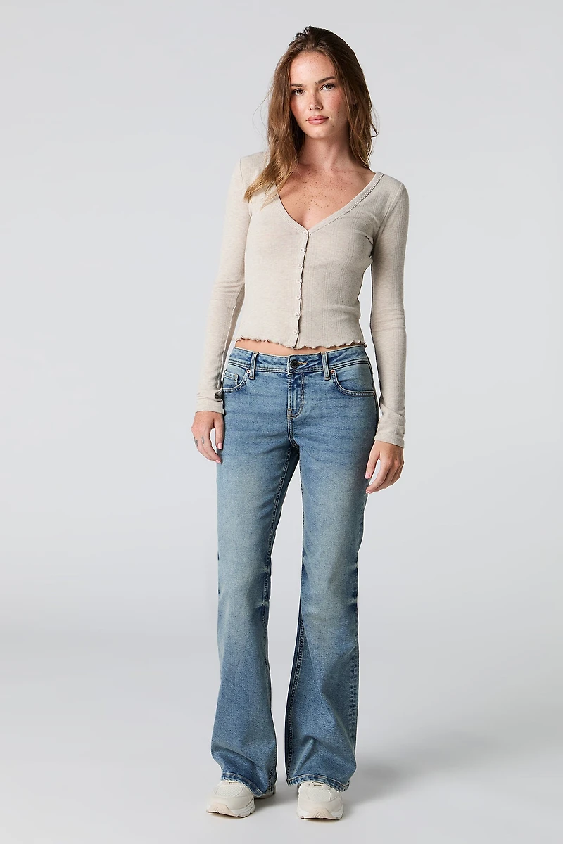 Haut boutonné en pointelle à col V