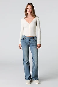 Haut boutonné en pointelle à col V