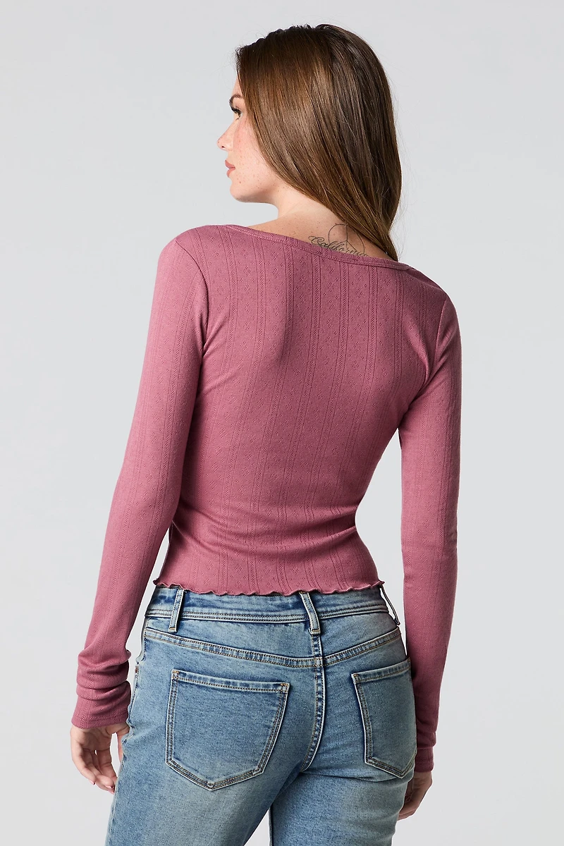 Haut boutonné en pointelle à col V