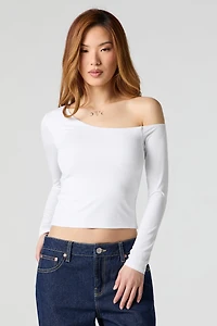 Haut profilé à manches longues avec épaules dénudées