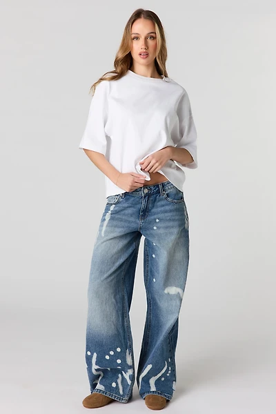 Jean baggy à taille basse avec éclaboussures de peinture