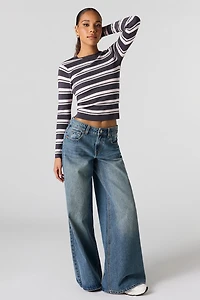 Jean à jambe super large avec motif embossé taille basse