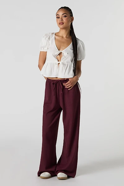 Pantalon habillé texturé fluide à jambe large