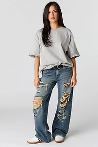 Jean baggy délavé moyen déchiré à taille basse