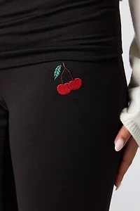 Legging à jambe évasée avec motif brodé