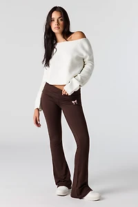Legging à jambe évasée avec motif brodé