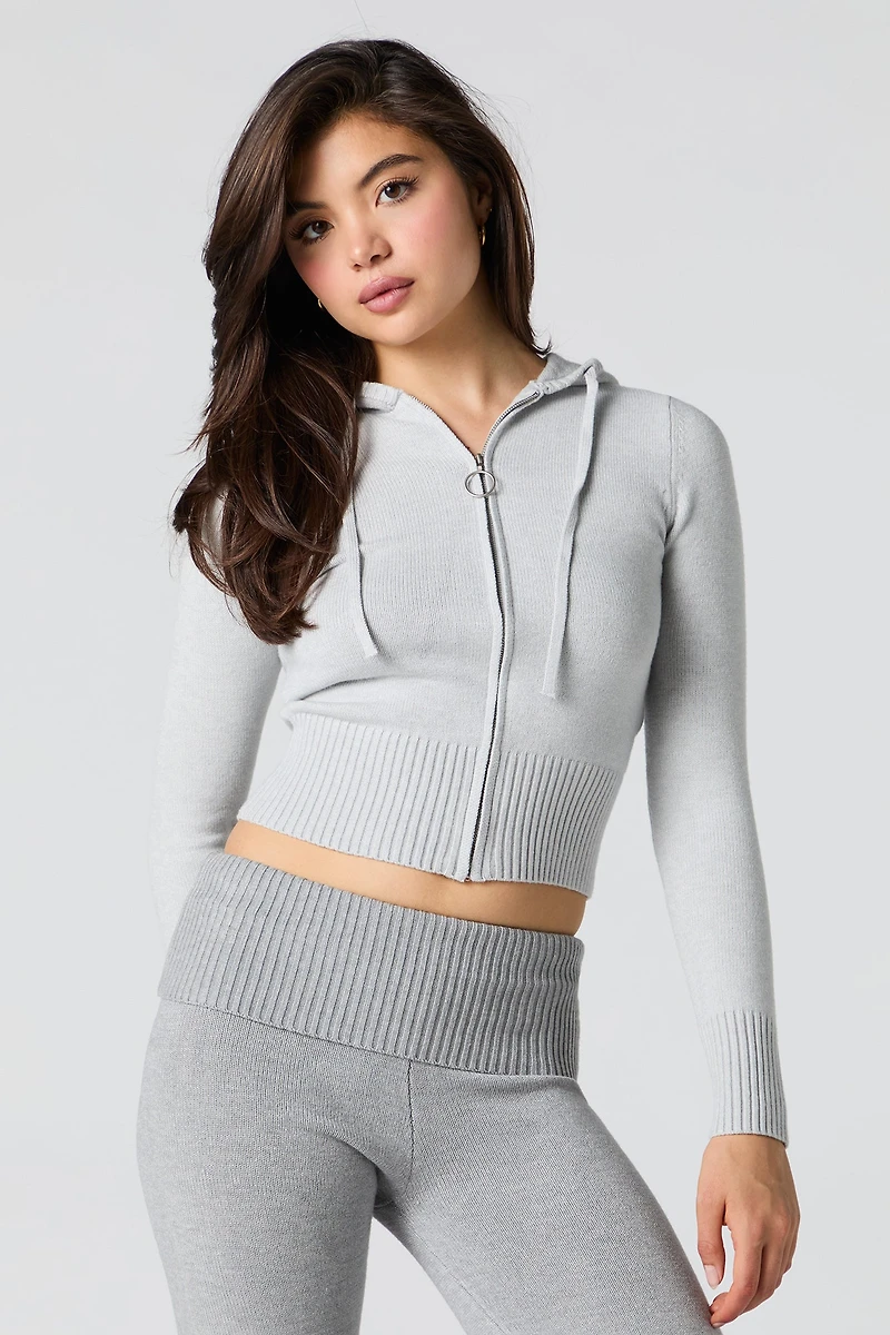 Haut à capuchon en tricot jacquard et glissière