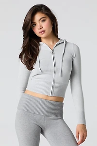 Haut à capuchon en tricot jacquard et glissière