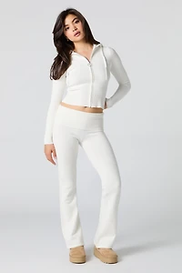 Haut à capuchon en tricot jacquard et glissière