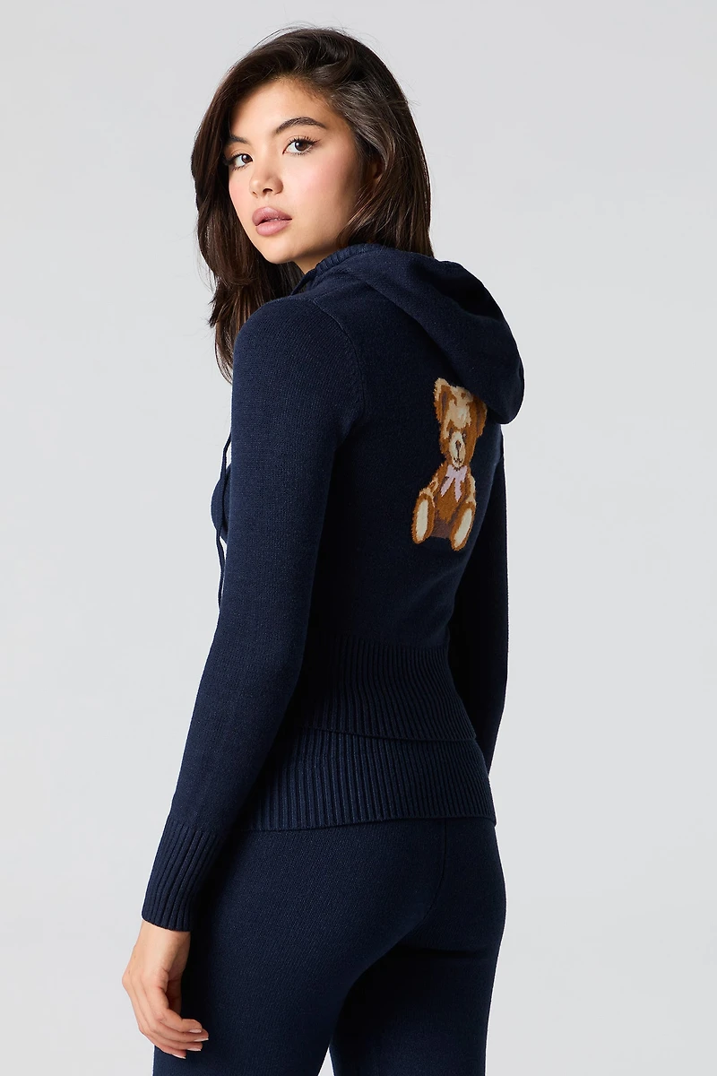 Haut à capuchon en tricot jacquard et glissière