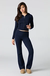 Haut à capuchon en tricot jacquard et glissière