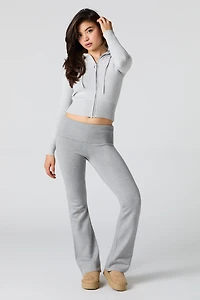 Pantalon en tricot à taille repliée et jambe évasée