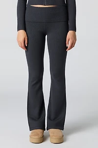 Pantalon en tricot à taille repliée et jambe évasée