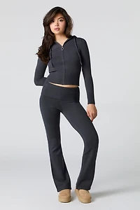 Pantalon en tricot à taille repliée et jambe évasée