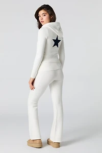 Pantalon en tricot à taille repliée et jambe évasée