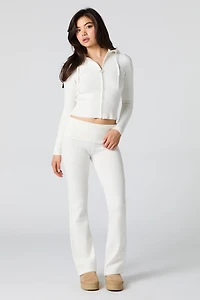 Pantalon en tricot à taille repliée et jambe évasée