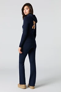 Pantalon en tricot à taille repliée et jambe évasée