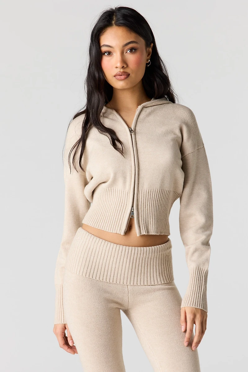 Haut à capuchon en tricot avec fermeture glissière double