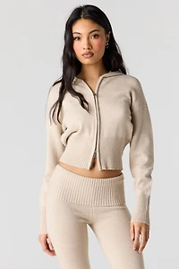 Haut à capuchon en tricot avec fermeture glissière double