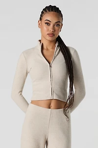 Haut en tricot côtelé à manches longues avec fermeture glissière