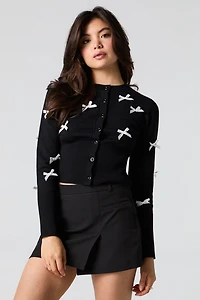 Cardigan boutonné avec boucle en 3D