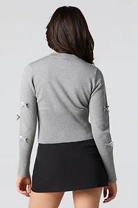 Cardigan boutonné avec boucle en 3D