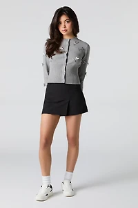 Cardigan boutonné avec boucle en 3D